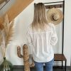 blouse blanche de dos