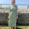Robe verte midi à col V avec marguerite