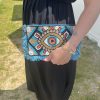 pochette femme œil bleu