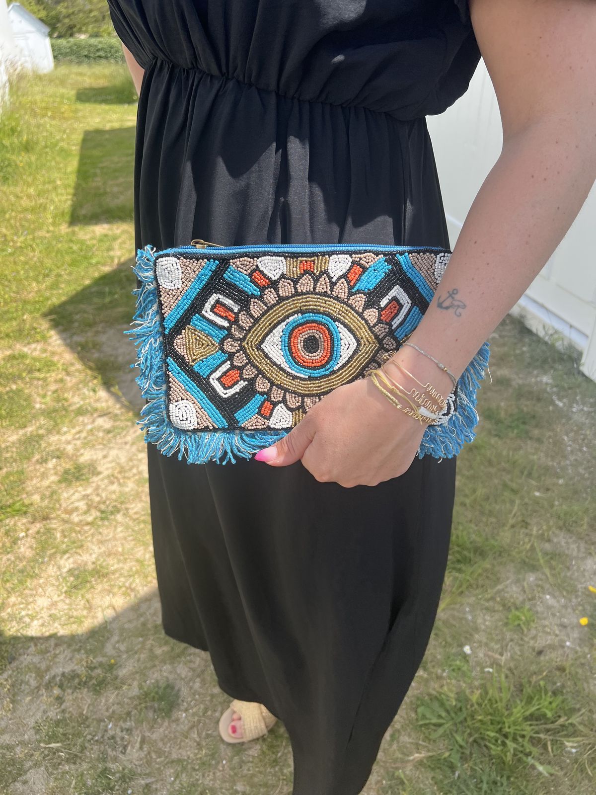 pochette femme œil bleu