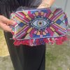 Pochette femme œil fuchsia