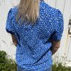 Blouse à imprimé marguerite bleu