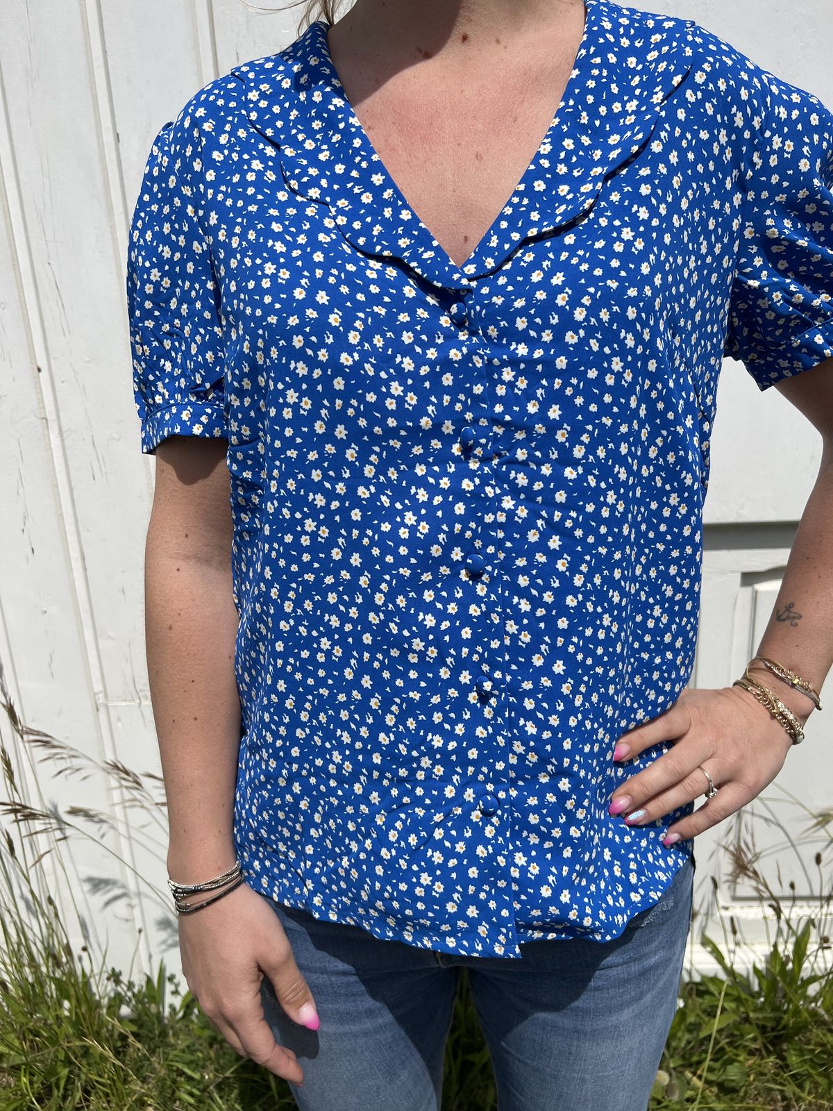 top bleu face blouse à imprimé marguerite bleu