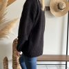 gilet en maille noir de profil