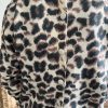 pull léopard boutons au dos
