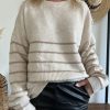 pull beige et or