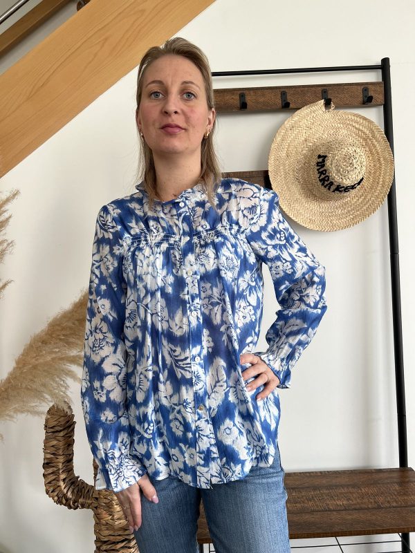Blouse bleu et blanche
