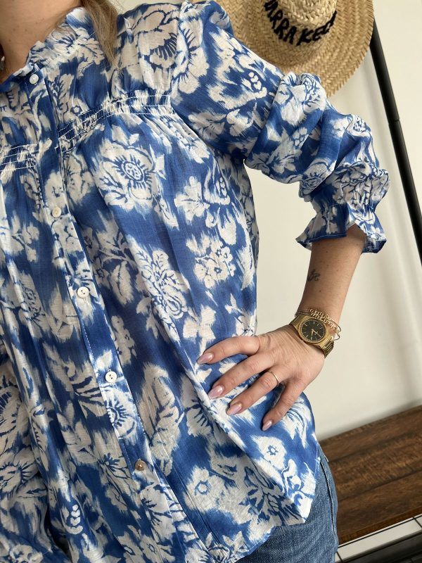 Blouse bleu et blanche