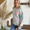 gilet gris à fleurs