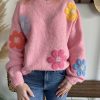 pull rose à fleurs