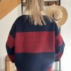 Pull polo femme