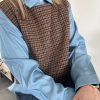 pull sans manches carreaux