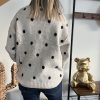 Pull gris à pois
