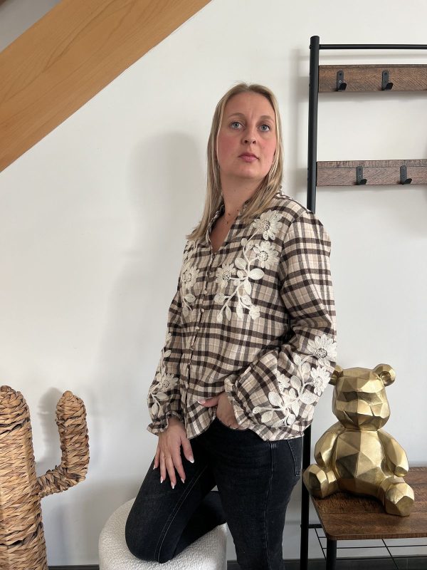 Blouse à carreaux avec broderie