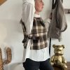 pull sans manches kaki