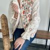 veste sans manches floral et chemise en broderie anglaise
