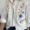 veste sans manches brodée fleurie
